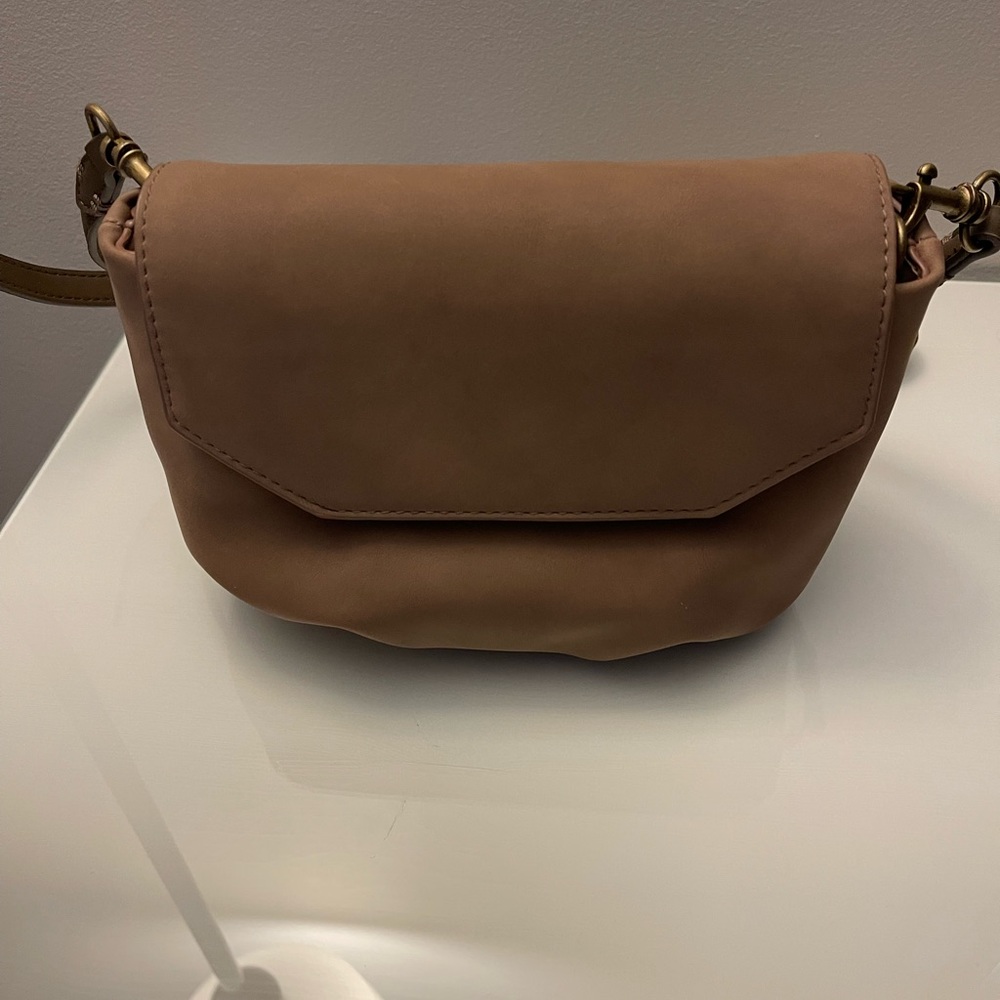 Brown sued purse